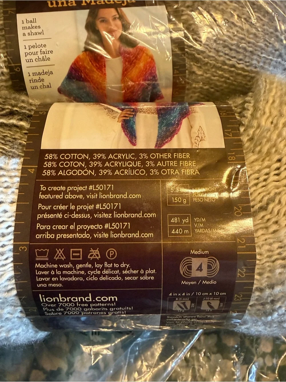 Lion brand shawl in a ball in mindful mauve, two balls new in plastic.